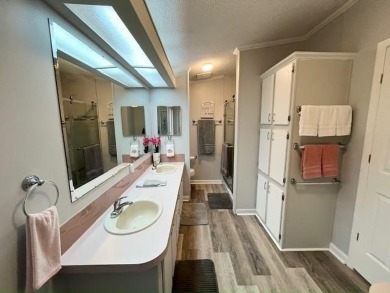 This beautifully updated 2bd, 2ba home is situated on a private on Del Tura Golf and Country Club in Florida - for sale on GolfHomes.com, golf home, golf lot