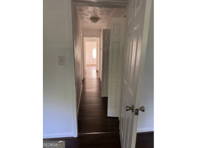East Atlanta Deal:  This four side brick single family house was on East Lake Golf Club in Georgia - for sale on GolfHomes.com, golf home, golf lot