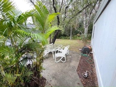 This beautifully updated 2bd, 2ba home is situated on a private on Del Tura Golf and Country Club in Florida - for sale on GolfHomes.com, golf home, golf lot