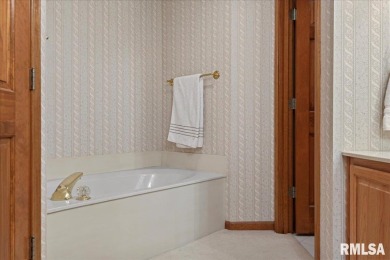 This absolute GEM of a home is located in the desirable Panther on Panther Creek Country Club in Illinois - for sale on GolfHomes.com, golf home, golf lot