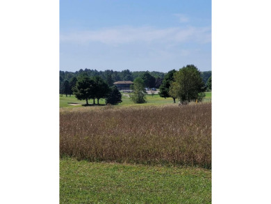 Nestled along the scenic fairways of Logger's Trace Golf Course on Greenbush Golf Course in Michigan - for sale on GolfHomes.com, golf home, golf lot