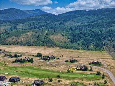 Stunning custom home site overlooking Hole 7 of the Hale Irwin on Teton Reserve in Idaho - for sale on GolfHomes.com, golf home, golf lot