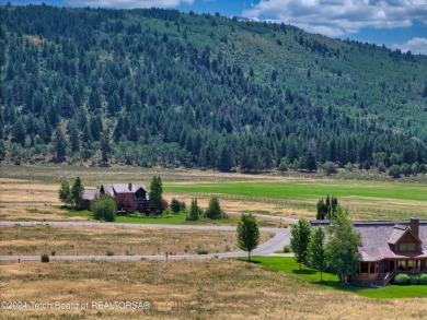 Stunning custom home site overlooking Hole 7 of the Hale Irwin on Teton Reserve in Idaho - for sale on GolfHomes.com, golf home, golf lot