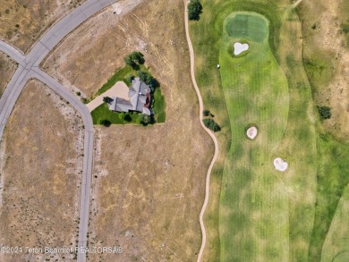 Stunning custom home site overlooking Hole 7 of the Hale Irwin on Teton Reserve in Idaho - for sale on GolfHomes.com, golf home, golf lot