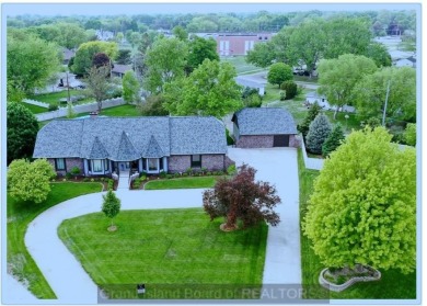 Iconic Grand Island home! Located on the south side of town near on Riverside Country Club in Nebraska - for sale on GolfHomes.com, golf home, golf lot