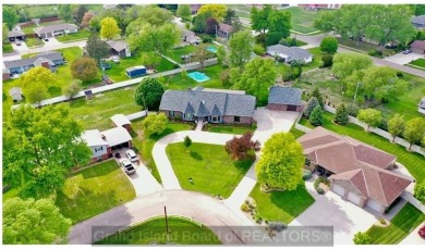 Iconic Grand Island home! Located on the south side of town near on Riverside Country Club in Nebraska - for sale on GolfHomes.com, golf home, golf lot