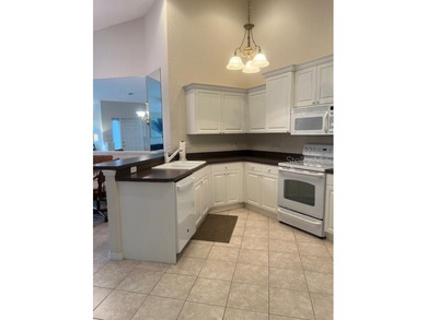 Welcome to the community of Sabal Trace.
This move-in-ready on Sabal Trace Golf and Country Club in Florida - for sale on GolfHomes.com, golf home, golf lot