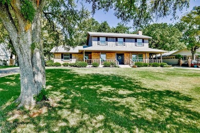 Welcome to this charming 4 bedroom, 3 bath home located in the on De Cordova Bend Country Club in Texas - for sale on GolfHomes.com, golf home, golf lot