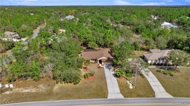 Welcome to this amazing Pool Home with a Brand New Roof! Located on Sugarmill Woods Golf and Country Club in Florida - for sale on GolfHomes.com, golf home, golf lot