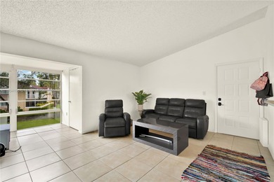 Spacious 3BR/2BA condo in the desirable Doral Park Country Club on Jim McLean Signature Course in Florida - for sale on GolfHomes.com, golf home, golf lot