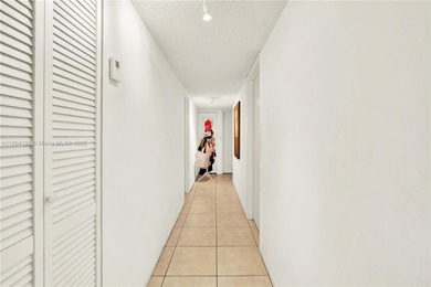 Spacious 3BR/2BA condo in the desirable Doral Park Country Club on Jim McLean Signature Course in Florida - for sale on GolfHomes.com, golf home, golf lot