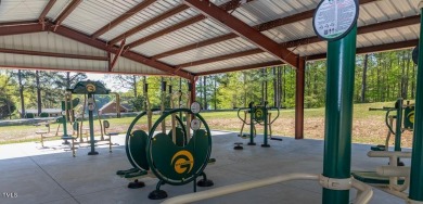 Come own your piece of paradise. This is an excellent buildable on River Golf and County Club at Lake Royale in North Carolina - for sale on GolfHomes.com, golf home, golf lot