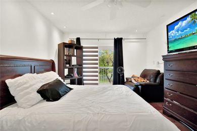 Spacious 3BR/2BA condo in the desirable Doral Park Country Club on Jim McLean Signature Course in Florida - for sale on GolfHomes.com, golf home, golf lot