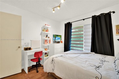 Spacious 3BR/2BA condo in the desirable Doral Park Country Club on Jim McLean Signature Course in Florida - for sale on GolfHomes.com, golf home, golf lot