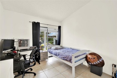 Spacious 3BR/2BA condo in the desirable Doral Park Country Club on Jim McLean Signature Course in Florida - for sale on GolfHomes.com, golf home, golf lot