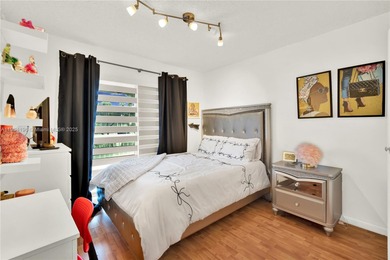 Spacious 3BR/2BA condo in the desirable Doral Park Country Club on Jim McLean Signature Course in Florida - for sale on GolfHomes.com, golf home, golf lot