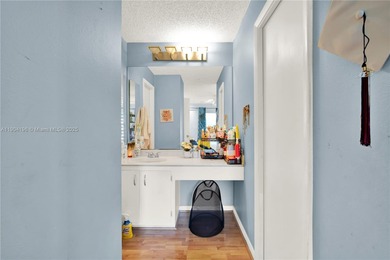 Spacious 3BR/2BA condo in the desirable Doral Park Country Club on Jim McLean Signature Course in Florida - for sale on GolfHomes.com, golf home, golf lot