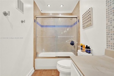 Spacious 3BR/2BA condo in the desirable Doral Park Country Club on Jim McLean Signature Course in Florida - for sale on GolfHomes.com, golf home, golf lot