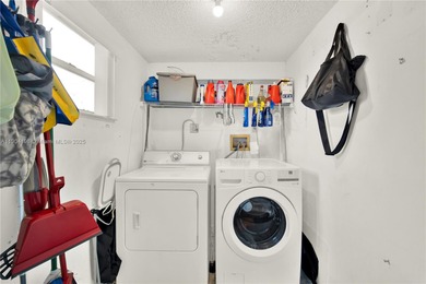 Spacious 3BR/2BA condo in the desirable Doral Park Country Club on Jim McLean Signature Course in Florida - for sale on GolfHomes.com, golf home, golf lot