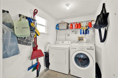 Spacious 3BR/2BA condo in the desirable Doral Park Country Club on Jim McLean Signature Course in Florida - for sale on GolfHomes.com, golf home, golf lot