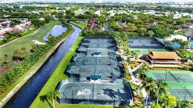 Spacious 3BR/2BA condo in the desirable Doral Park Country Club on Jim McLean Signature Course in Florida - for sale on GolfHomes.com, golf home, golf lot