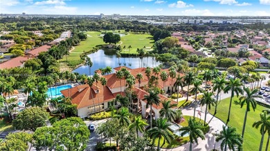 Spacious 3BR/2BA condo in the desirable Doral Park Country Club on Jim McLean Signature Course in Florida - for sale on GolfHomes.com, golf home, golf lot