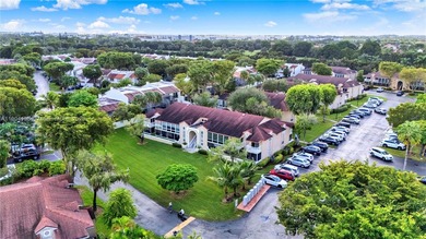 Spacious 3BR/2BA condo in the desirable Doral Park Country Club on Jim McLean Signature Course in Florida - for sale on GolfHomes.com, golf home, golf lot
