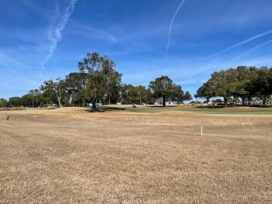 Duplex with golf course home site. Wide open views of the 3rd on On Top of the World Golf Course in Florida - for sale on GolfHomes.com, golf home, golf lot