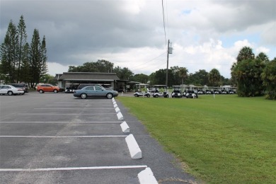 This single-family home located in Unit 2 of Mainlands by the on Mainlands Golf Club in Florida - for sale on GolfHomes.com, golf home, golf lot