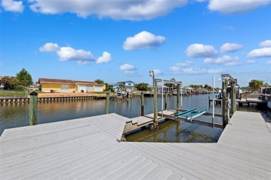 Embrace the Florida lifestyle in Dana Shores, where waterfront on Rocky Point Golf Course in Florida - for sale on GolfHomes.com, golf home, golf lot