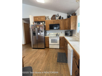 Spacious Golf Course Home - located on the 7th hole of the Star on Cedar Creek Golf Course in Wyoming - for sale on GolfHomes.com, golf home, golf lot