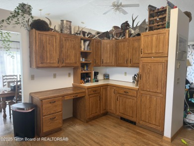 Spacious Golf Course Home - located on the 7th hole of the Star on Cedar Creek Golf Course in Wyoming - for sale on GolfHomes.com, golf home, golf lot