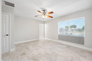 Embrace the Florida lifestyle in Dana Shores, where waterfront on Rocky Point Golf Course in Florida - for sale on GolfHomes.com, golf home, golf lot