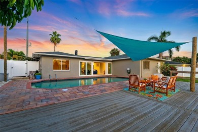 Embrace the Florida lifestyle in Dana Shores, where waterfront on Rocky Point Golf Course in Florida - for sale on GolfHomes.com, golf home, golf lot