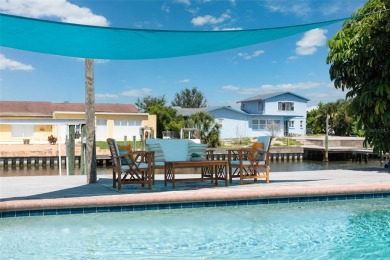 Embrace the Florida lifestyle in Dana Shores, where waterfront on Rocky Point Golf Course in Florida - for sale on GolfHomes.com, golf home, golf lot