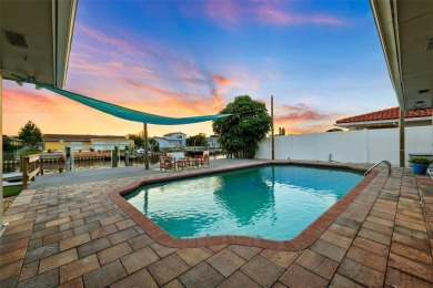 Embrace the Florida lifestyle in Dana Shores, where waterfront on Rocky Point Golf Course in Florida - for sale on GolfHomes.com, golf home, golf lot