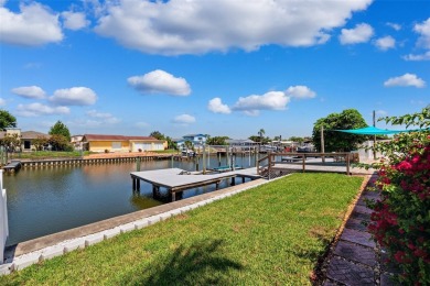 Embrace the Florida lifestyle in Dana Shores, where waterfront on Rocky Point Golf Course in Florida - for sale on GolfHomes.com, golf home, golf lot