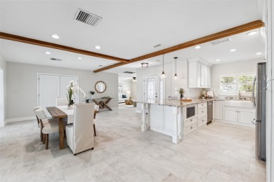 Embrace the Florida lifestyle in Dana Shores, where waterfront on Rocky Point Golf Course in Florida - for sale on GolfHomes.com, golf home, golf lot