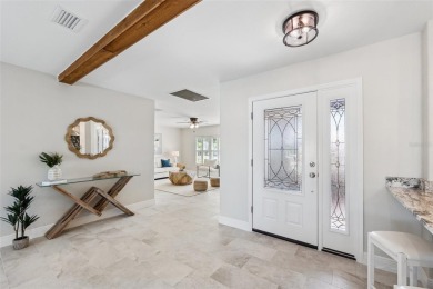 Embrace the Florida lifestyle in Dana Shores, where waterfront on Rocky Point Golf Course in Florida - for sale on GolfHomes.com, golf home, golf lot