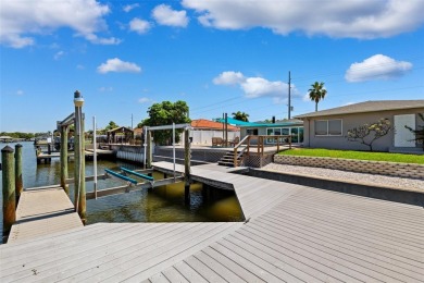 Embrace the Florida lifestyle in Dana Shores, where waterfront on Rocky Point Golf Course in Florida - for sale on GolfHomes.com, golf home, golf lot