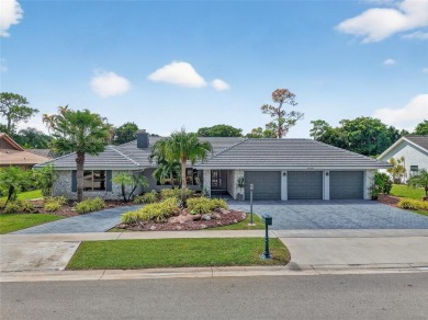 Welcome to 10182 Boca Woods Ln, Boca Raton, FL 33428--where on Boca Woods Country Club in Florida - for sale on GolfHomes.com, golf home, golf lot