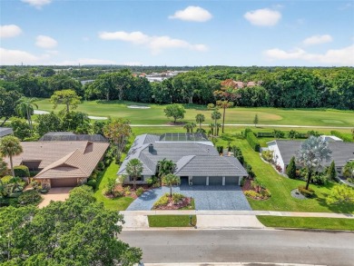 Welcome to 10182 Boca Woods Ln, Boca Raton, FL 33428--where on Boca Woods Country Club in Florida - for sale on GolfHomes.com, golf home, golf lot