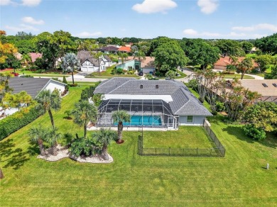 Welcome to 10182 Boca Woods Ln, Boca Raton, FL 33428--where on Boca Woods Country Club in Florida - for sale on GolfHomes.com, golf home, golf lot