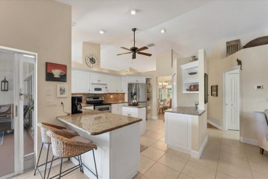 CASUAL ELEGANCE MEETS FLORIDA TRANQUILITY IN THIS FORMER MODEL on Rotonda Golf and Country Club The Palms Course in Florida - for sale on GolfHomes.com, golf home, golf lot