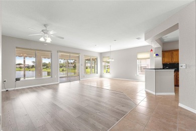 Stunning lakefront property with panoramic views of Lake on Eagle Ridge At Spruce Creek Country Club in Florida - for sale on GolfHomes.com, golf home, golf lot