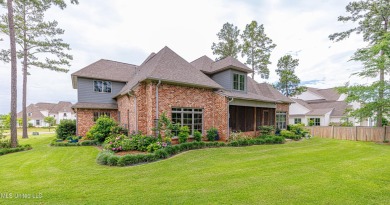 Stunning Reunion Golf Course Home with Luxurious Amenities! on Reunion Golf Club in Mississippi - for sale on GolfHomes.com, golf home, golf lot