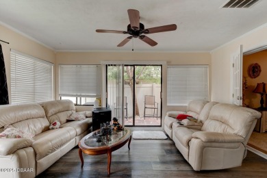 Step inside this beautifully updated 3-bedroom, 2-bath, 2-car on The Club At Pelican Bay - North Course in Florida - for sale on GolfHomes.com, golf home, golf lot