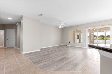 Stunning lakefront property with panoramic views of Lake on Eagle Ridge At Spruce Creek Country Club in Florida - for sale on GolfHomes.com, golf home, golf lot