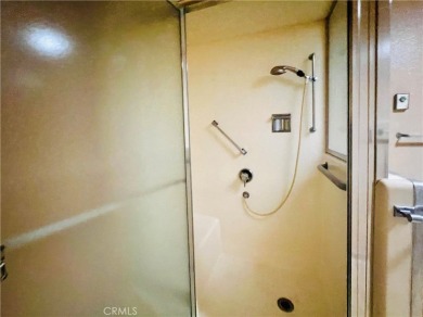 Charming 1BD/1BA stock cooperative in the 55+ gated community of on Leisure World Seal Beach Golf Course in California - for sale on GolfHomes.com, golf home, golf lot