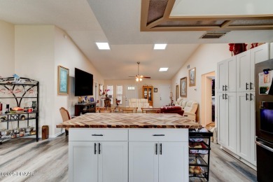 Step inside this beautifully updated 3-bedroom, 2-bath, 2-car on The Club At Pelican Bay - North Course in Florida - for sale on GolfHomes.com, golf home, golf lot